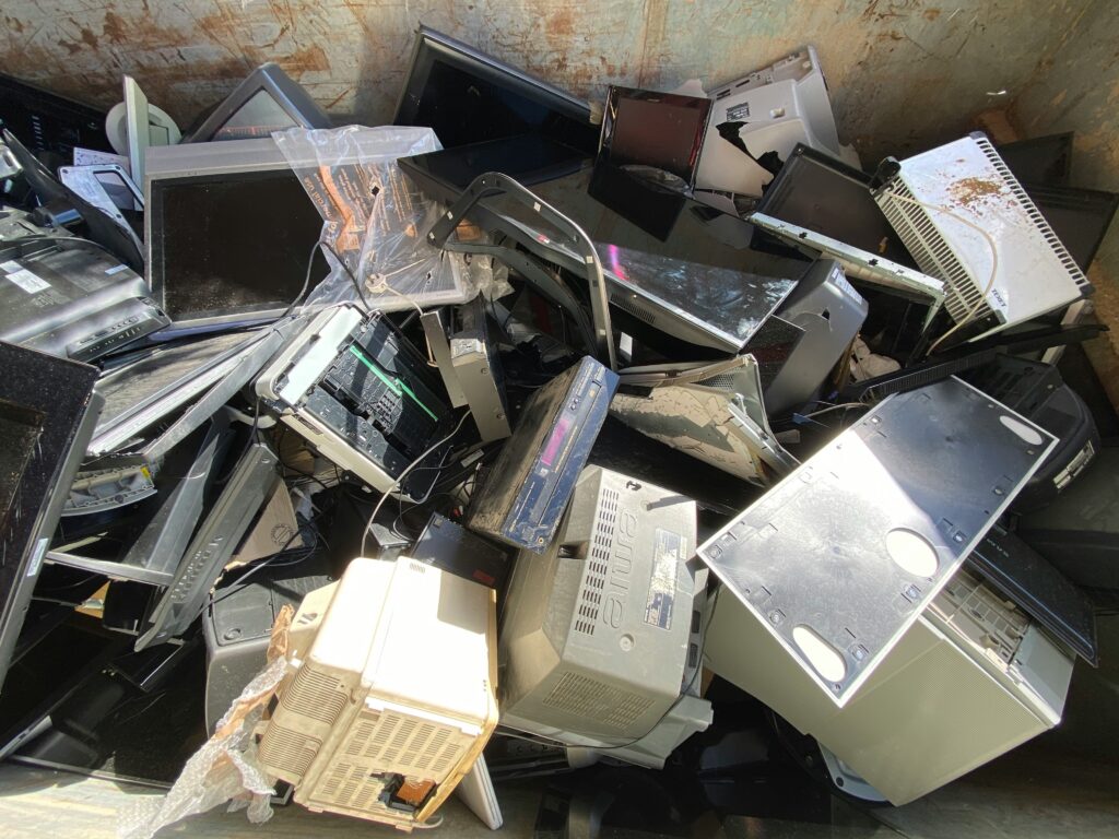 A junkyard of electronic waist set to be recycled.